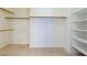 Walk-in closet featuring built in shelving and hanging rods, offering great storage at 8249 Jo Marcy Dr, Las Vegas, NV 89131