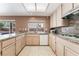 Well-equipped kitchen featuring granite countertops, modern appliances, and abundant cabinet space at 8277 Mount Nido Dr, Las Vegas, NV 89147