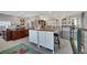 Bright and spacious loft area with desk space, storage, and a comfortable seating area at 8537 Eureka Heights Ct, Las Vegas, NV 89178