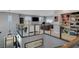 Open loft area with stylish railing, tv, bookshelves and plenty of natural light at 8537 Eureka Heights Ct, Las Vegas, NV 89178
