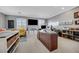 Well-lit office space with built-in desk, storage, and comfortable seating at 8537 Eureka Heights Ct, Las Vegas, NV 89178