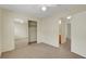 Bedroom featuring neutral carpet, closet, and access to a bathroom at 8725 W Flamingo Rd # 240, Las Vegas, NV 89147