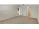 Bedroom featuring neutral walls and carpet with a doorway to another room at 8725 W Flamingo Rd # 240, Las Vegas, NV 89147