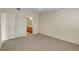 Bedroom with neutral carpet, doorway to bath at 8725 W Flamingo Rd # 240, Las Vegas, NV 89147