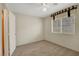 Bedroom featuring neutral carpet and window with blinds at 8725 W Flamingo Rd # 240, Las Vegas, NV 89147