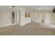 Bright and airy living room with neutral paint and flooring, showcasing a welcoming atmosphere at 8725 W Flamingo Rd # 240, Las Vegas, NV 89147