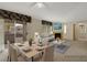 Inviting living room with fireplace, plush seating, and sliding glass door to the balcony at 8725 W Flamingo Rd # 240, Las Vegas, NV 89147