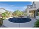 Expansive backyard featuring decorative rock and a covered patio for outdoor enjoyment at 9008 Sawhill Pond St, Las Vegas, NV 89131