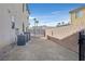 Spacious backyard awaiting personalization, with block wall, providing a blank canvas for outdoor living at 9008 Sawhill Pond St, Las Vegas, NV 89131