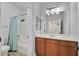 Clean bathroom with a shower-tub, vanity sink, and tile flooring creating a calming atmosphere at 9008 Sawhill Pond St, Las Vegas, NV 89131