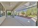 Covered patio featuring an outdoor ceiling fan, garden and shade structure for relaxing and entertaining at 9008 Sawhill Pond St, Las Vegas, NV 89131