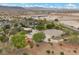 Community area including volleyball courts, walking paths and community buildings at 9060 Watermelon Seed Ave, Las Vegas, NV 89143