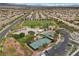 Community park with basketball, and tennis courts, playground, and green spaces at 9060 Watermelon Seed Ave, Las Vegas, NV 89143