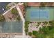 Aerial shot of community courts, tennis and basketball, with walking paths and parking at 9060 Watermelon Seed Ave, Las Vegas, NV 89143
