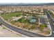 Beautiful park with tennis and basketball courts, play area, and green space at 9060 Watermelon Seed Ave, Las Vegas, NV 89143