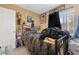 Bedroom with a bed, side table, and ample natural light at 9060 Watermelon Seed Ave, Las Vegas, NV 89143