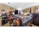 Bedroom with carpeted floors, ceiling fan, and ample natural light at 9060 Watermelon Seed Ave, Las Vegas, NV 89143