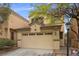 Charming two-story home featuring a spacious two-car garage and well-maintained landscaping at 9060 Watermelon Seed Ave, Las Vegas, NV 89143