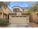Charming two-story home featuring a spacious two-car garage and well-maintained landscaping at 9060 Watermelon Seed Ave, Las Vegas, NV 89143