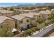 Charming two-story home with patio and well-maintained landscaping in a vibrant community with mountain views at 9060 Watermelon Seed Ave, Las Vegas, NV 89143