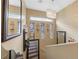Staircase with stained glass and decorative lighting fixtures at 9060 Watermelon Seed Ave, Las Vegas, NV 89143