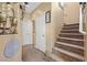 Hallway with carpeted stairs and modern lighting at 9060 Watermelon Seed Ave, Las Vegas, NV 89143