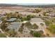 Community recreation area featuring tennis courts, a basketball court, and a playground at 9060 Watermelon Seed Ave, Las Vegas, NV 89143