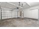 Spacious two-car garage with ample storage cabinets and concrete flooring at 9543 Havasu Canyon Ave, Las Vegas, NV 89166