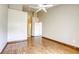 Spacious bedroom with natural light and hardwood style flooring throughout at 9664 Emeraude Ave, Las Vegas, NV 89147