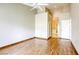 A bedroom leads to a bathroom with a shower, tub, and a white door at 9664 Emeraude Ave, Las Vegas, NV 89147