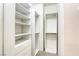 Walk-in closet with custom shelving, drawers, and ample storage space at 9664 Emeraude Ave, Las Vegas, NV 89147
