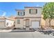Charming two-story home with green shutters and a well-maintained front yard at 9958 Fragile Fields St, Las Vegas, NV 89183