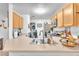 Bright kitchen with updated countertops, modern appliances, and eat-in bar at 9958 Fragile Fields St, Las Vegas, NV 89183
