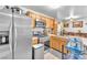 Well-equipped kitchen with stainless steel appliances and light wood cabinetry at 9958 Fragile Fields St, Las Vegas, NV 89183