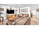 Inviting living room with comfortable seating, stylish decor, and plenty of natural light at 9958 Fragile Fields St, Las Vegas, NV 89183