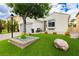 Charming single-story home with a well-manicured lawn and drought-tolerant landscaping at 11244 Playa Caribe Ave, Las Vegas, NV 89138
