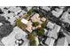 Aerial view of estate featuring distinctive architecture, swimming pool, and lush landscaping at 11814 Canons Brook Dr, Las Vegas, NV 89141