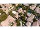 Aerial view of estate featuring a unique architectural design, swimming pool, and mature landscaping at 11814 Canons Brook Dr, Las Vegas, NV 89141