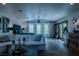 Bright living room with comfortable seating, stylish decor, and a relaxing ambiance, perfect for entertaining at 11814 Canons Brook Dr, Las Vegas, NV 89141