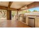 Outdoor kitchen area featuring stainless steel appliances and plenty of counter space at 11814 Canons Brook Dr, Las Vegas, NV 89141