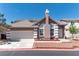 Charming single-Gathering home with a two-car garage and a well-maintained front yard at 121 Golf Course St, Las Vegas, NV 89145