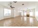Bright, open living room with tile floors, a fireplace, and ample natural light at 121 Golf Course St, Las Vegas, NV 89145