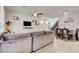 Inviting living room with plush sofa, neutral walls, and stylish ceiling fan at 12391 Pinetina St, Las Vegas, NV 89141