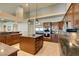 Stylish kitchen featuring an island with seating and stainless steel appliances, perfect for cooking and entertaining at 1341 Marina Del Rey Ct, Las Vegas, NV 89117