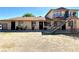 Exterior of a multifamily residence with stairwell access to the units and view of the front yard at 1520 Henry Dr, Las Vegas, NV 89110