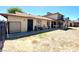 View of the backyard and stairwell access to the units of this multifamily residence at 1520 Henry Dr, Las Vegas, NV 89110