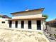 Back view of a multi-Gathering home featuring multiple entry doors and security features at 1520 Henry Dr, Las Vegas, NV 89110