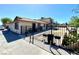 Exterior of the property featuring fencing and private entryways plus well-maintained landscaping at 1524 Henry Dr, Las Vegas, NV 89110