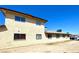 Exterior view of property featuring multi-level dwelling with security bars on windows at 1524 Henry Dr, Las Vegas, NV 89110