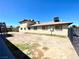 Exterior of the multi-Gathering dwelling with fenced back yard and secure private entry at 1524 Henry Dr, Las Vegas, NV 89110